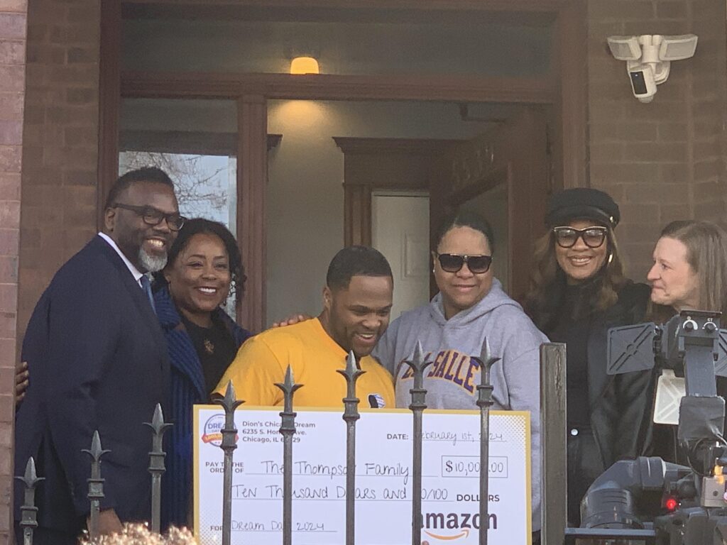 Dion Dawson, Monica Thompson, Mayor Brandon Johnson, Ald. Stephanie Coleman (16th) and State Rep. Sonya Harper (D-Chicago) pose with a big $10,000 check from Dion's Chicago Dream, sponsored by Amazon. 